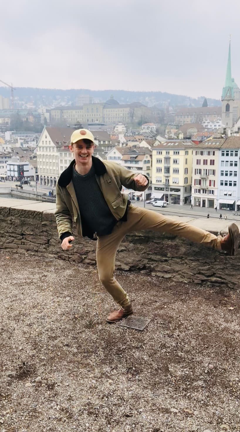 picture of Chris jumping in front of Zurich